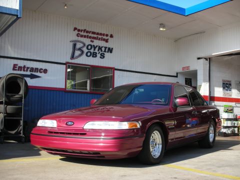 1992 Ford Crown Victoria - Maroon 1992 Ford Crown Victoria at Boykin Bob's Performance & Customizing, showing its front 3/4 view.