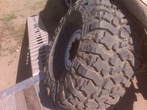 1992 Ford F-350 - This photo shows a single off-road tire and wheel, not a 1992 Ford F-350.
