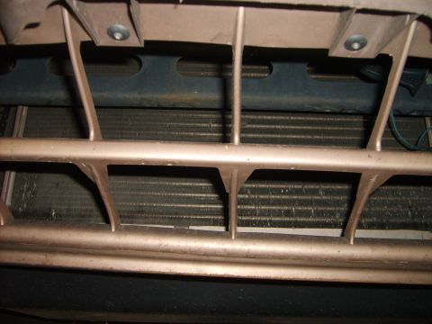 1993 Ford Crown Victoria - Close-up view of the front grille and radiator of a 1993 Ford Crown Victoria.