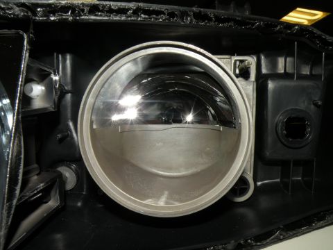 1998 Subaru Legacy - This image shows the internal components of a vehicle's headlight assembly, not the exterior of a car.