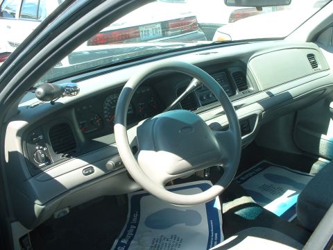 1999 Ford Crown Victoria - No cruise control on this one.