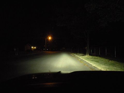 1998 Subaru Legacy - Driving down a dark suburban street at night, illuminated by headlights.