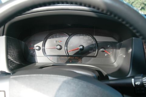 2006 Cadillac STS - Interior view of a vehicle's dashboard gauges, showing speed, RPM, and engine boost pressure.