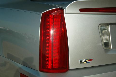 2006 Cadillac STS - Close-up of the rear of a 2006 Cadillac STS V-Series, showing the taillight and emblem.