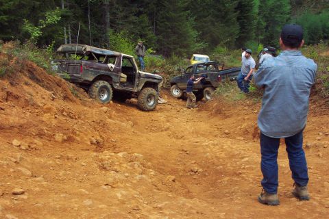 1996 Ford Bronco - Berne and crew doing vehicle recover duty for the Dodge Dakota Pickup that rolled on the PowerLine steep hill climb. (5/25/2003)
