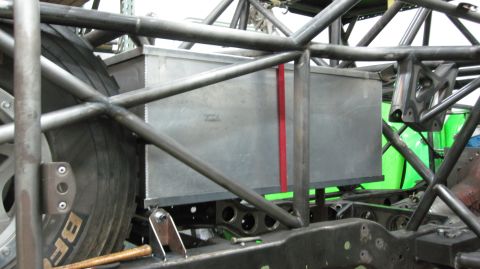 1995 Ford Bronco - The image shows a custom roll cage and a fuel cell, not a 1995 Ford Bronco.