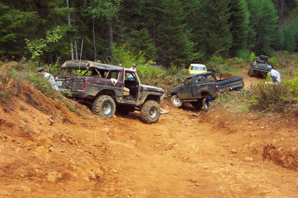 Berne and crew doing vehicle recover duty for the Dodge Dakota Pickup that rolled on the PowerLine steep hill climb.  <br>(5/25/2003)