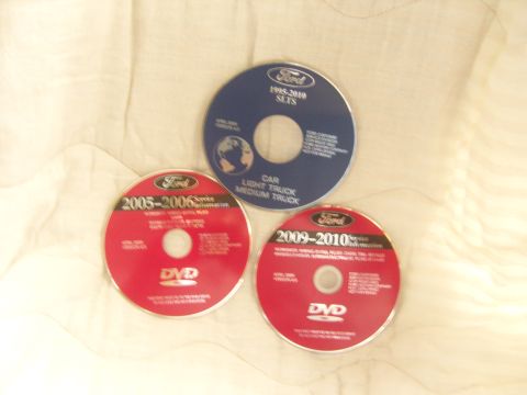 2007 Ford Mustang - Photograph of Ford factory service DVDs, not a technical document.