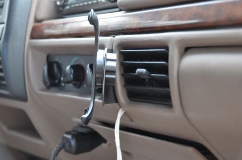 1996 Ford Bronco - Interior view of a 1996 Ford Bronco dashboard with climate controls and air vents visible.