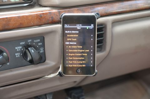 1996 Ford Bronco - An iPod displays various engine metrics, including fuel trim and air intake temperature, mounted on the car's dashboard.