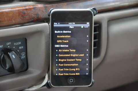 1996 Ford Bronco - An iPod Touch is mounted on the dashboard, displaying various OBD metrics.
