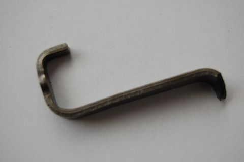 1979 Ford Bronco - A metal clip is shown against a plain background. The registry claims it is from a 1979 Ford Bronco, but this is not verifiable from the im…