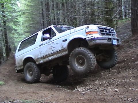 1996 Ford Bronco - Rounding a Corner on Bates Road Trail and Getting a Little Air. (5/25/2003)