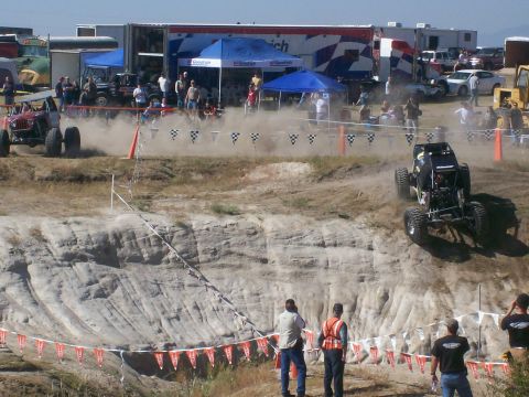 1993 Ford Bronco - Competitors navigate a challenging course during an off-road race event.