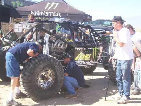 1993 Ford Bronco - Mechanics work on a custom off-road buggy sponsored by Monster Energy.
