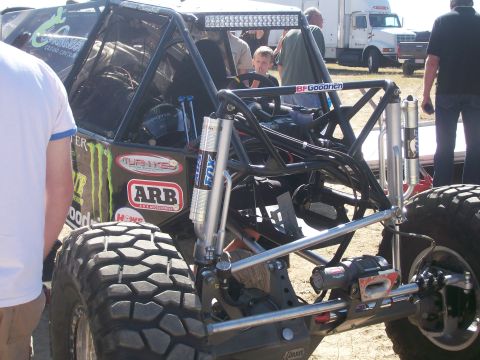 1993 Ford Bronco - Custom off-road buggy with extensive roll cage and suspension modifications.