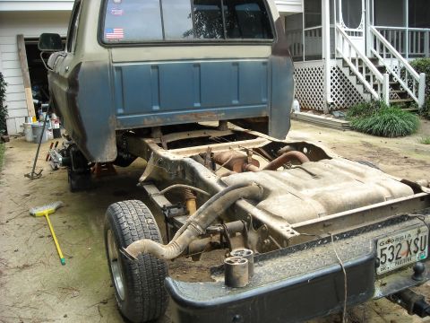 1979 Ford F-150 - The rear chassis of a 1979 Ford F-150 truck is shown, with the fuel tank and bumper visible.