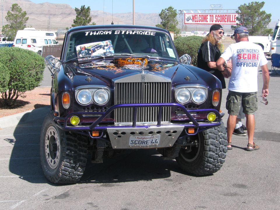 Purple Rolls-Royce converted to off-road racer with brush guard and big tires