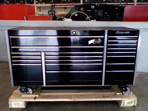 1986 Toyota Hilux - A large black Snap-on tool chest is shown on a wooden pallet with wheels.