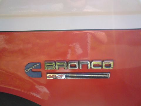 1989 Ford Bronco - This Ford Bronco features a Cummins badge, indicating a possible engine modification or trim level.