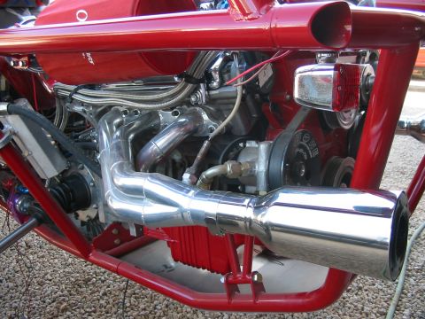 1993 Ford Taurus - Close-up of a custom engine and exhaust system, not a 1993 Ford Taurus.