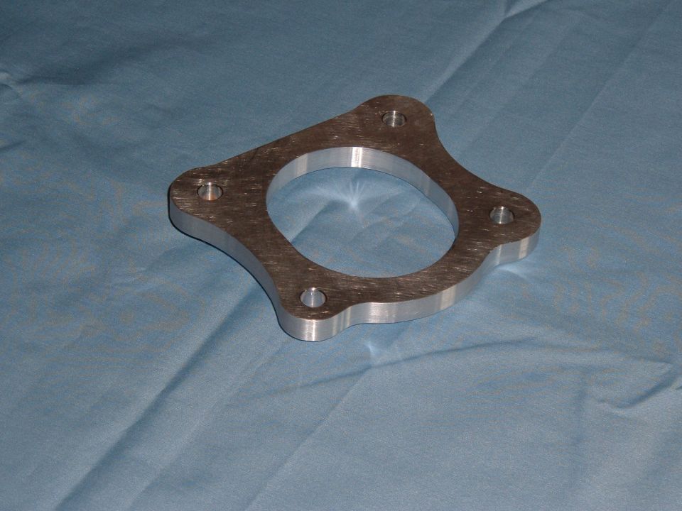 If it's carved out of one piece of metal, it's billet. My car has custom billet parts.