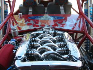 1993 Ford Taurus - Engine bay of a custom dune buggy, a V8 engine and Ford branding.