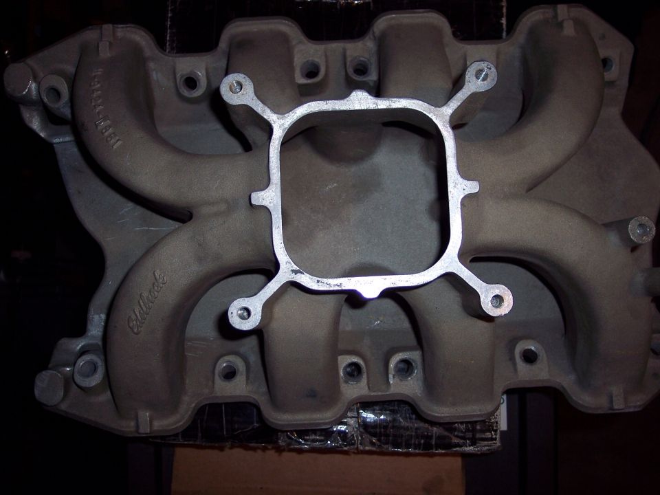 Aluminum intake manifold with 'Edelbrock' script and part number visible