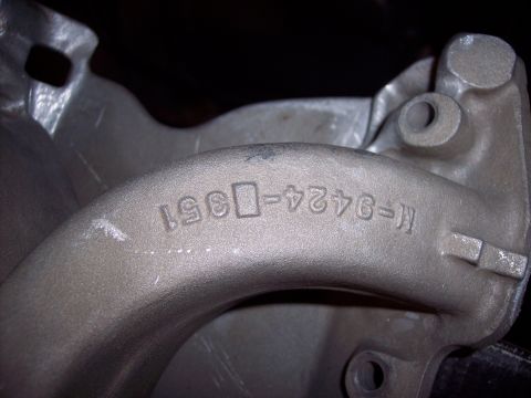 1971 Ford Mustang - Cast iron intake manifold with part number D9AE-9424-B351 visible.