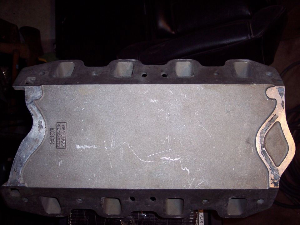 Engine intake manifold with casting numbers visible