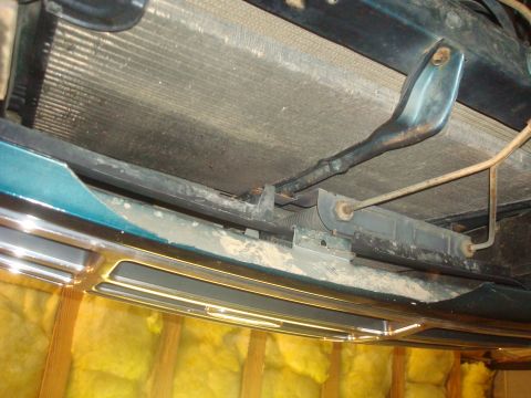 1995 Ford Bronco - This photo shows the front of a vehicle, focusing on the radiator and bumper area, with some steering components visible below.