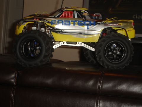 1989 Ford Bronco - This remote control monster truck has a custom paint job and large off-road tires.