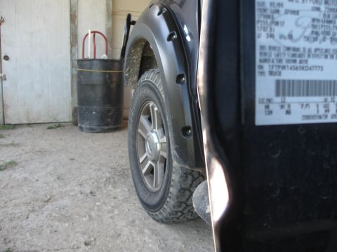 2005 Ford F-150 - Close-up of a 2005 Ford F-150 door label, showing the VIN and manufacturing details.