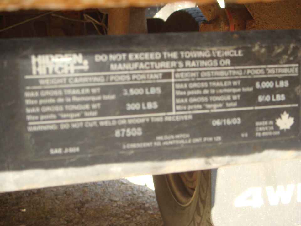 Trailer hitch data plate with weight ratings and manufacturing date 06/16/03