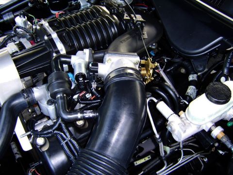 1996 Mercury Grand Marquis - Installed. Because of my unique configuration, the throttle body is mounted upside down so you don't get to see the 'pretty' side of the T/…