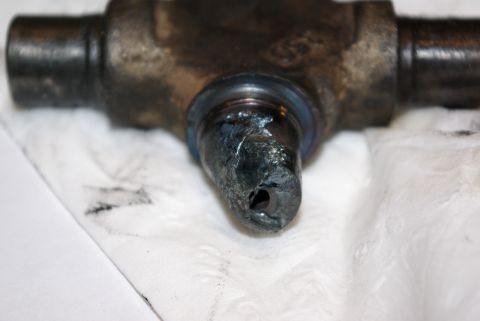 1995 Ford Bronco - Close-up of a damaged U-joint, likely requiring replacement.