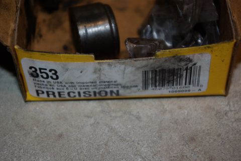 1995 Ford Bronco - A box labeled 'PRECISION' with a part number '353' is shown, containing automotive components.