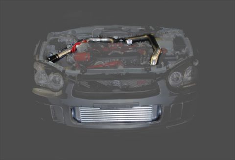 2004 Subaru Impreza - Engine bay of a 2004 Subaru Impreza shows an aftermarket exhaust system and front-mounted intercooler.