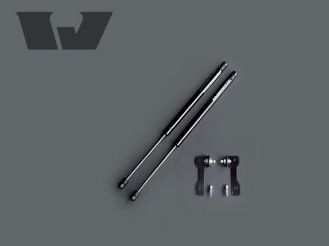 2004 Subaru Impreza - Hood struts and mounting hardware are displayed against a plain gray background.