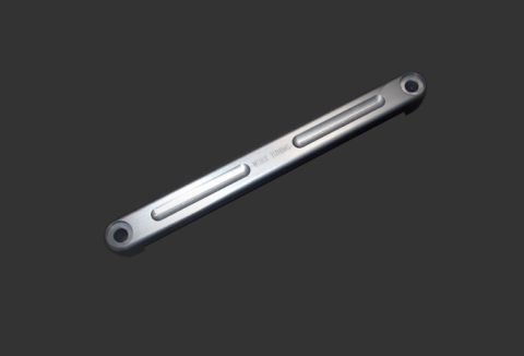 2004 Subaru Impreza - A silver strut bar with 'WORK TUNING' inscribed on it is shown against a dark background.
