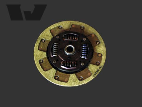 2004 Subaru Impreza - A close-up view of a vehicle clutch disc with visible springs and a central splined hub.