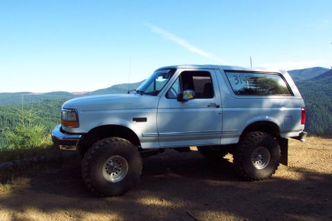 1996 Ford Bronco - Pacific Northwest Bronco. Feeling Right at Home on Top of Back to Back in Tillamook State Forest, OR(8/18/2002)
