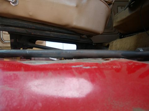 1984 Ford Bronco - The black piece is fairly straight. It shows light under it on the left side, but that is supposed to be there. Notice how level it is now.