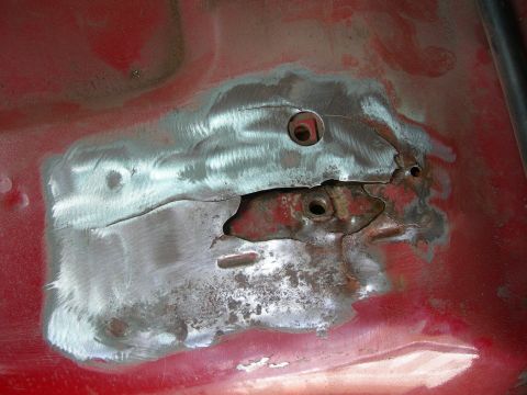 1984 Ford Bronco - The one that is bent down is the mount for left hand rear bolt.