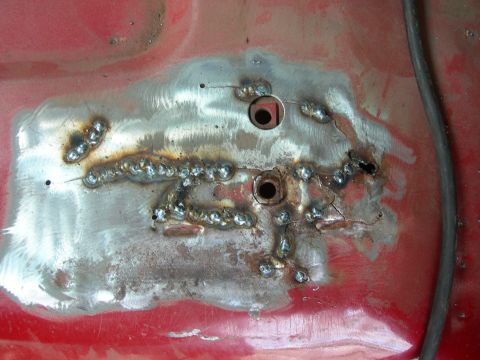 1984 Ford Bronco - I dirlled holes to keep the cracks from creeping further than they already were. If you look on the left, you will see the on that is just…