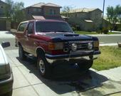 1990 Ford Bronco - This 1990 Ford Bronco is parked in a suburban driveway on a sunny day.