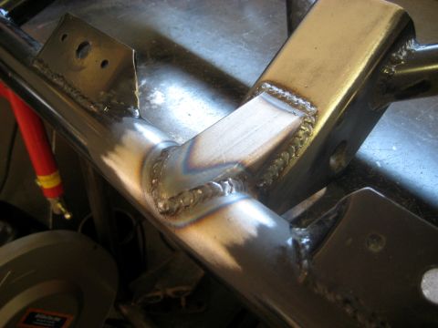 1996 Ford Bronco - Close-up of a custom welded metal frame, likely part of a fabrication project.