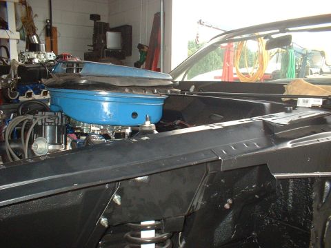 1970 Ford Torino - Engine bay of a 1970 Ford Torino, a blue air cleaner assembly.