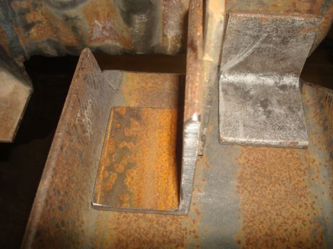 1995 Ford Bronco - This image shows welded metal brackets, not a 1995 Ford Bronco.