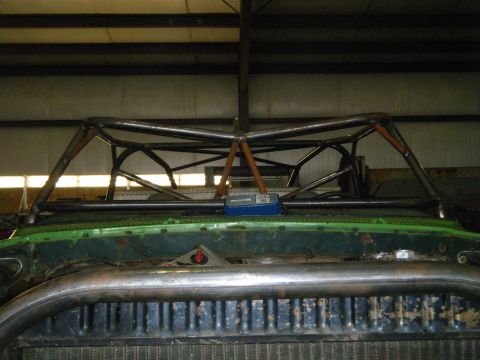 1978 Ford Bronco - Custom roll cage fabrication in progress on a vehicle.